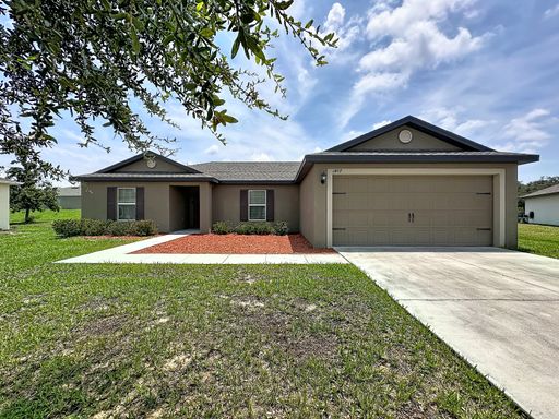 Spacious Open-Concept Living with Modern Finishes in Villate 7 Poinciana – photo 1