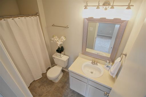 Check out this fantastic townhome near Cary Crossroads and Lake Johnson! – photo 1