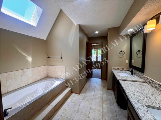  1317 E Sleepy Hollow Dr, Olathe, KS 66062