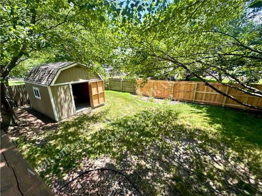  1317 E Sleepy Hollow Dr, Olathe, KS 66062