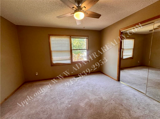  1317 E Sleepy Hollow Dr, Olathe, KS 66062