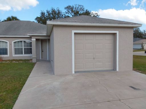Renovated 3/2/1 with tiled floors, screened in porch... 50% off 1st month rent – photo 1
