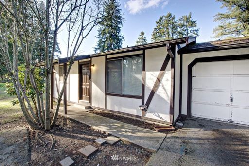 Updated Home on a Quiet, Tree-Lined Property