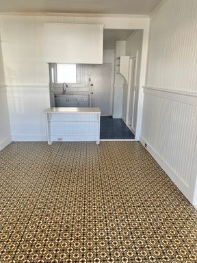 2 bedroom/ 1 bathroom unit with 1 parking stall – photo 1