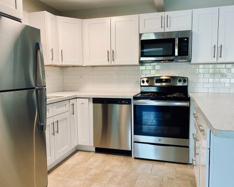 LOCATION IS THE KEY: Beautiful Condo located less than 1 block from I-355! Balcony/Patio/Private Parking! In unit Laundry!