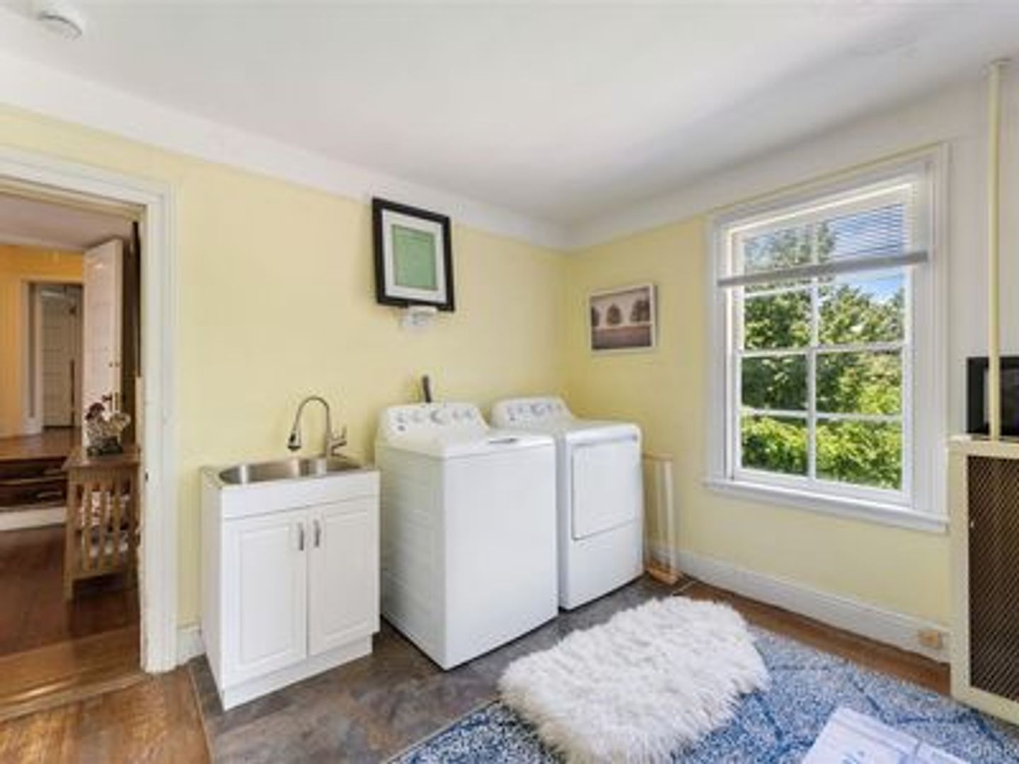 Laundry room at 5 Trinity Place LLC (1 of 2)