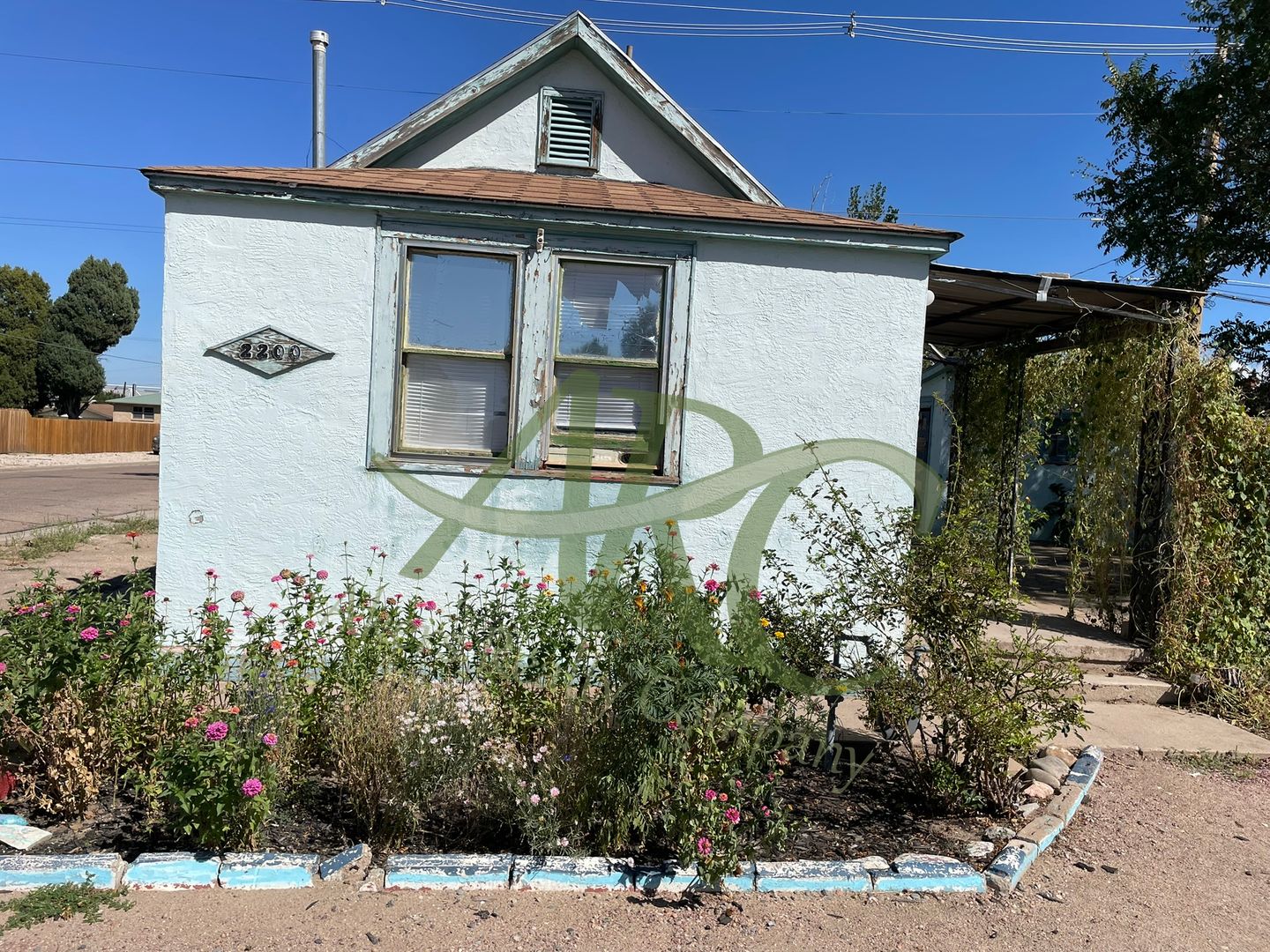 Pueblo House: 2200 Spruce St