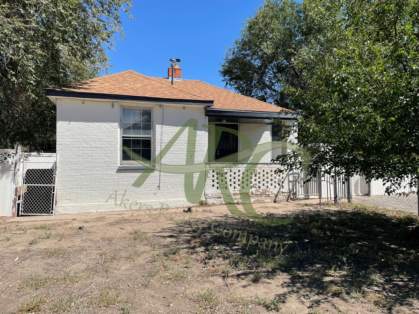 Pueblo House: 1702 Van Buren St