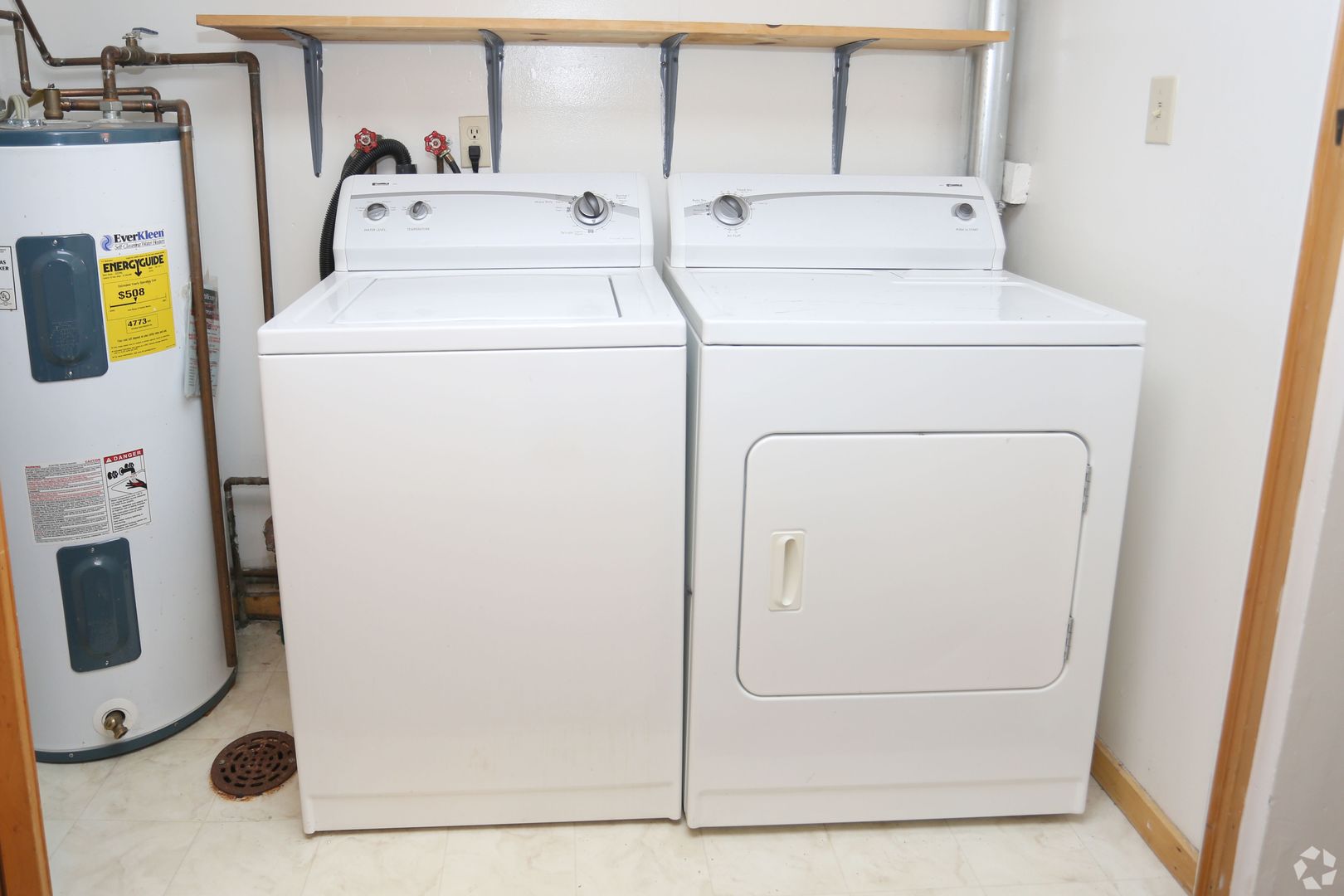 Laundry room at MOHPT Hyde Park Townhomes