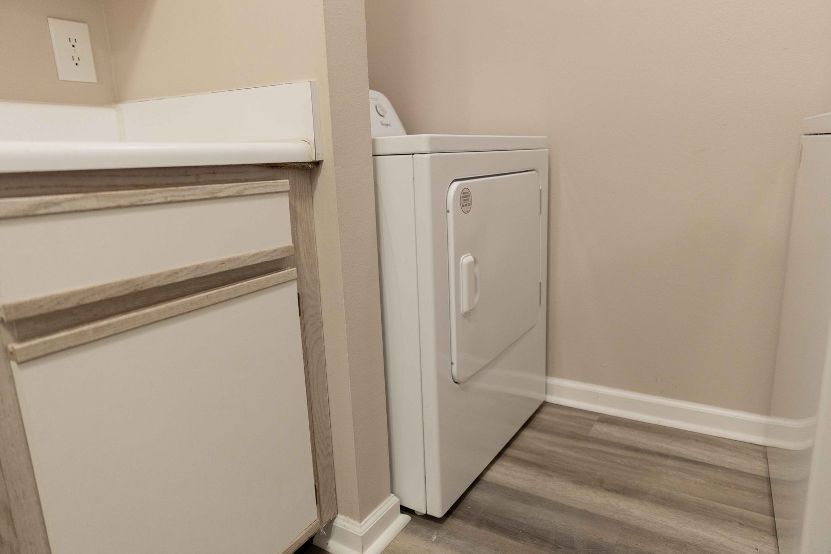 Laundry room at ARCHA Carriage House Apartments (4 of 4)