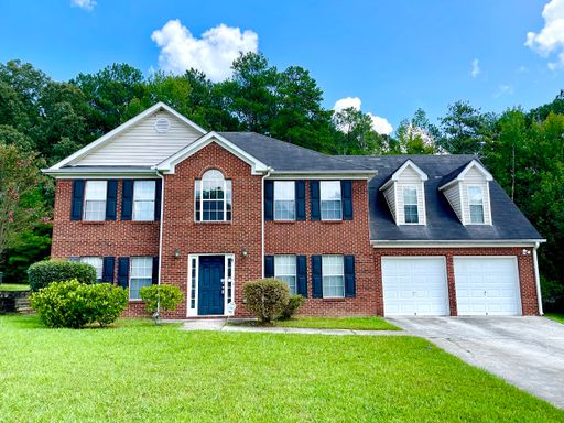 Welcome to this spacious 4 bedroom, 2.5 bathroom home located in Lithonia, GA. – photo 1