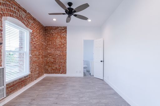 Bachelor with Brick Exposure – photo 1