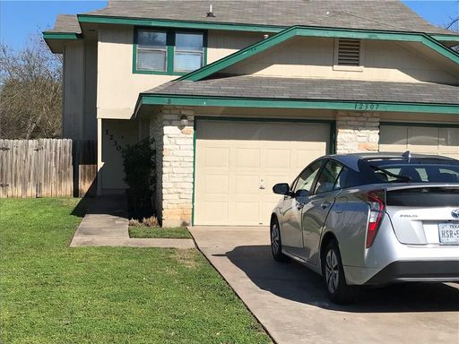 Welcome home to this charming two-story duplex in a fantastic Northwest Austin location! – photo 1