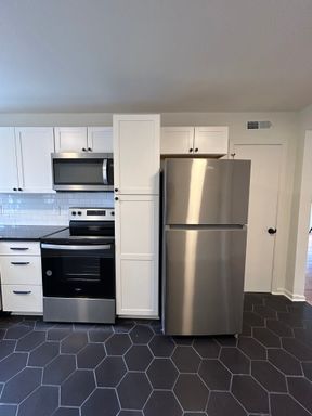 Welcome Home to Highland Commons – Where Classic Charm Meets Modern Living! – photo 1
