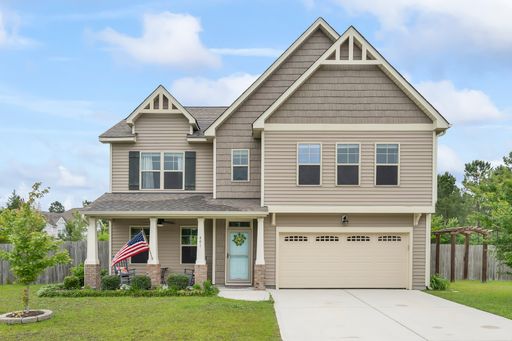 Gorgeous Craftsman Home with Fenced Yard in The Village of Folkstone! – photo 1