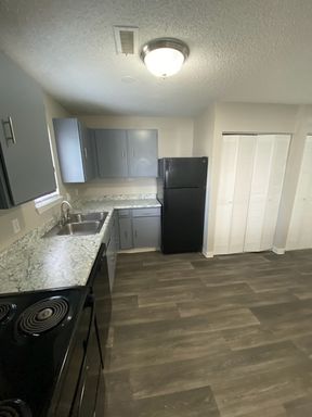 Beautifully Updated Three Bedroom Townhome With Washer and Dryer Connections! – photo 1