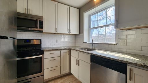 ***DOWNTOWN CLAYTON***Updated Large Two Bedroom***Highly Walkable***In Unit Washer and Dryer