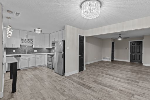 Anic Orchards***Heart of Downtown Old Webster, Large Floorplan***Garage Parking Included***In Unit Washer and Dryer