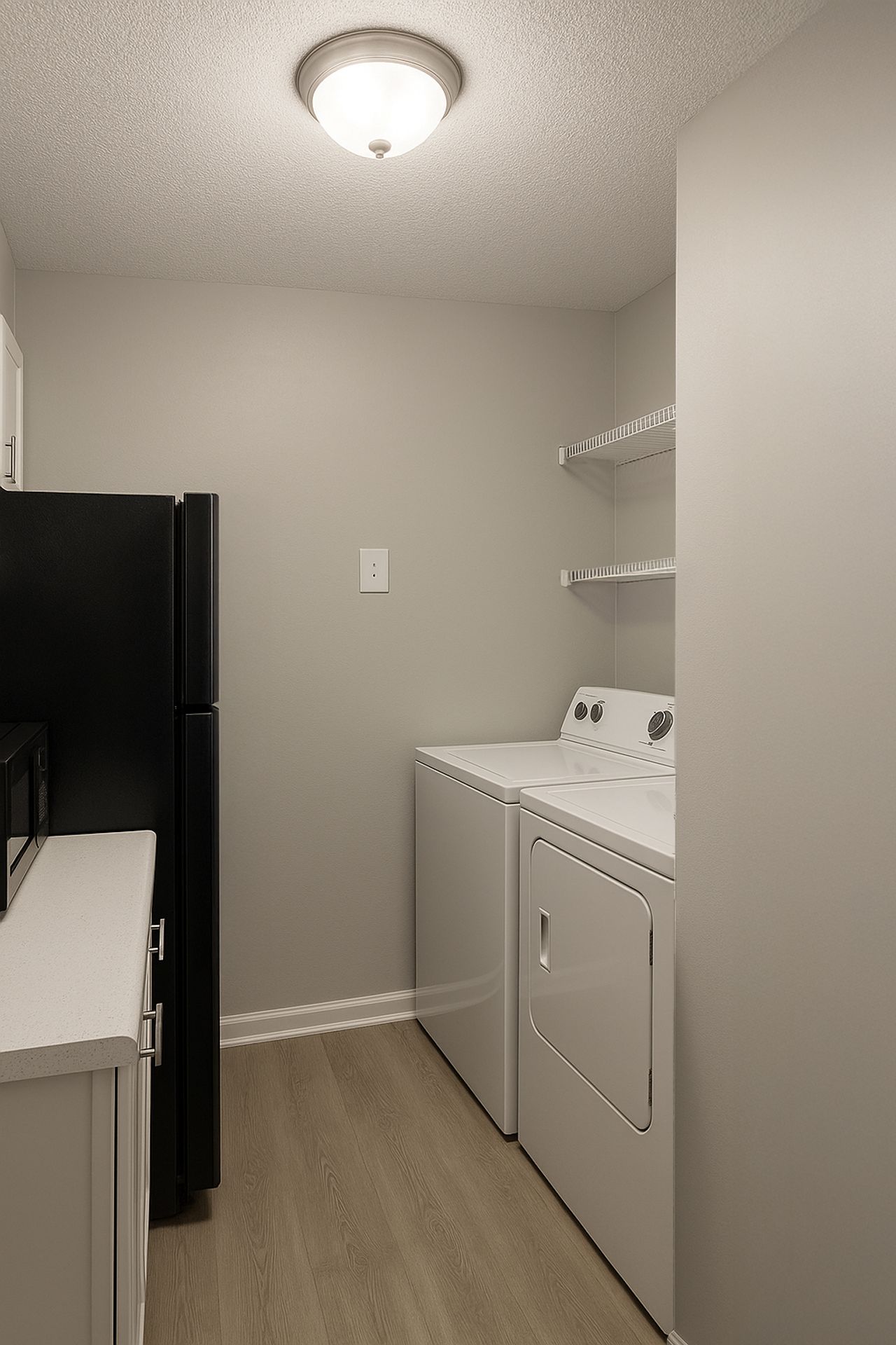 Laundry room at Anthos at Chase Ridge of Riverdale LLC
