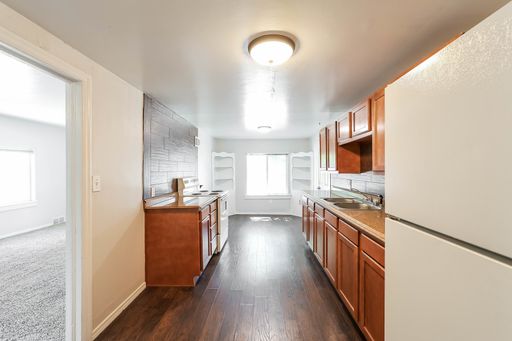 Wonderful 2 Story 2-Bedroom Unit -Available Early December! Washer Dryer In-Unit! Directly across from Brighton High.