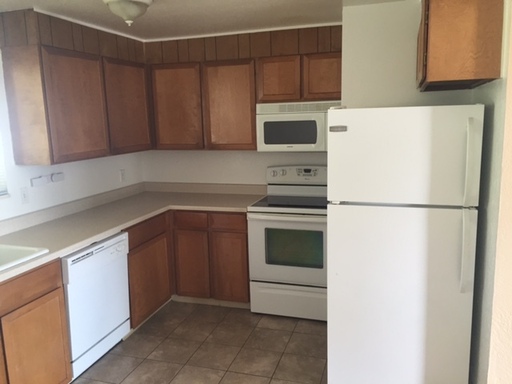 Great 3 Bed, 2 bath Unit with Onsite Laundry, Front and Rear Entry, and Deck Space!