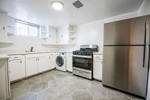 2 Bed 1 Bath Garden Level Apartment Walking Distance to Downtown Golden and Colorado School of Mines! Free Off Street Parking & W/D In Unit!