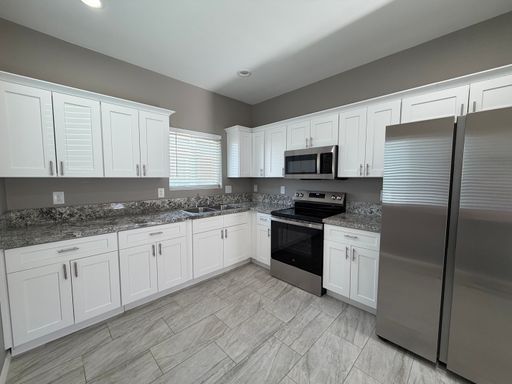 Newer duplex near U of A – photo 1
