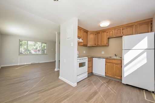 Save up to $1295! Large 2 Bed and 1 Bath Main Level Unit - Abundant Lighting, Hard Floors, Off Street Parking! – photo 1