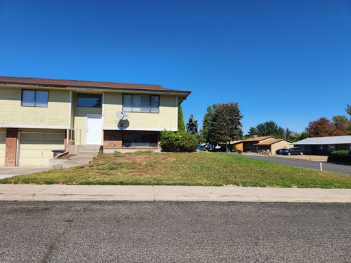 W. Logan 3+bedroom w/attached garage and all new carpet. – photo 1
