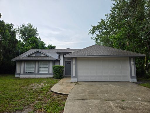 Three bedroom, two bathroom, two car garage with large private backyard. – photo 1