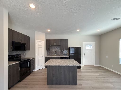 Water, sewer, and lawn care provided