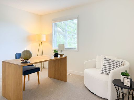 Spacious Two-Bedroom Townhome with Main Floor Bedroom Suite and One Month Free! – photo 1