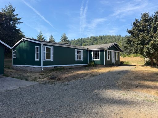 3 Bedroom 2 Bath with Garage and acreage.