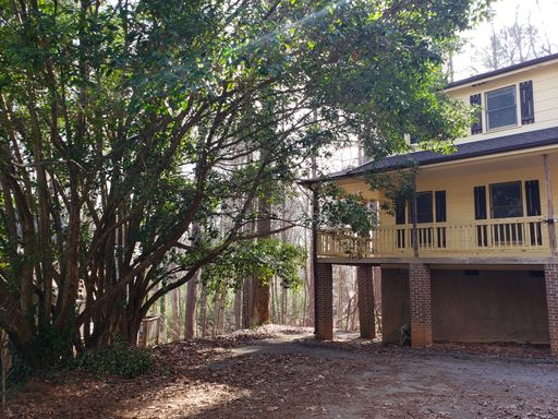 2-bedroom, 1.5-bathroom Triplex Unit – photo 1