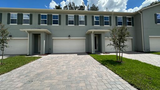 Modern 4BR/2.5BA Townhome | LVP Throughout | Lawn Care Included – photo 1