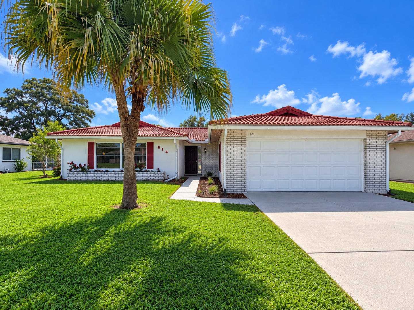 Poinciana House: 614 Midiron Dr