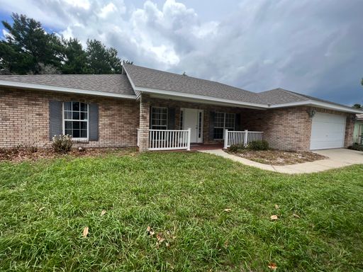 Charming 4-bedroom, 2-bathroom Deltona Lakes Home Available October! – photo 1