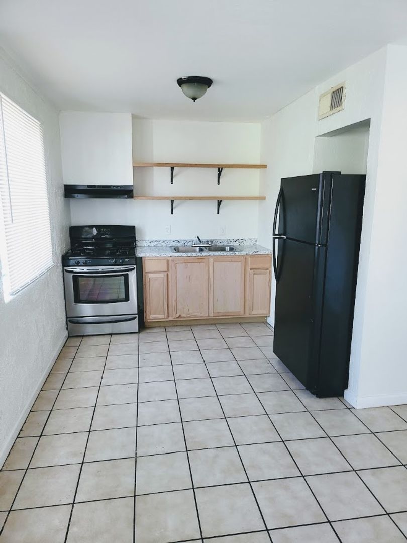 Apartment kitchen — representative home at 814 East Siesta Drive.