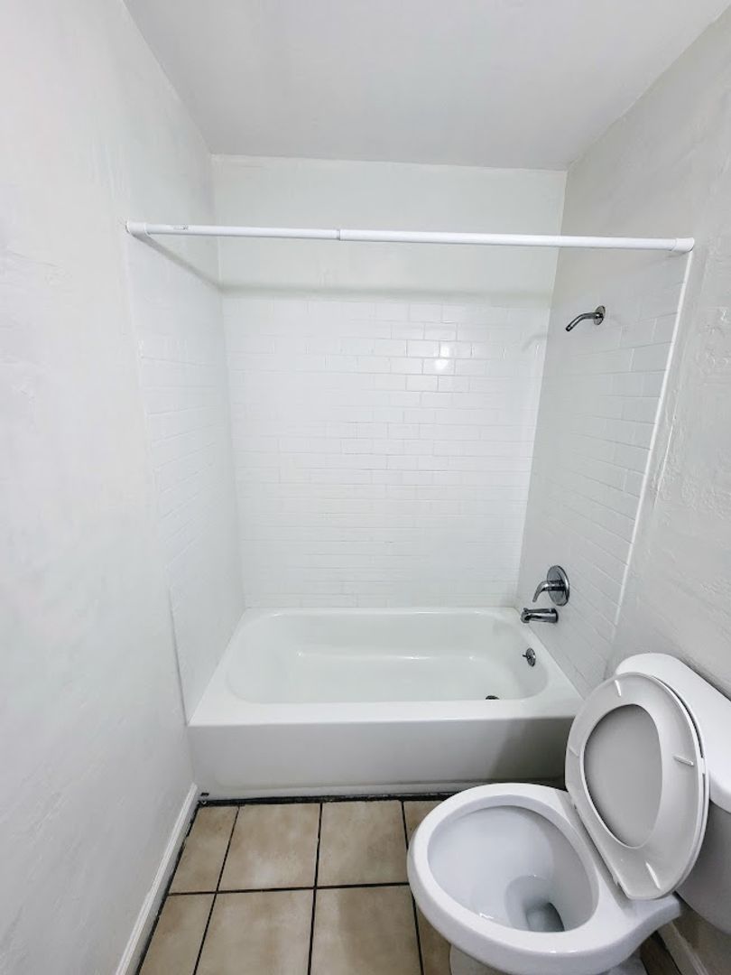 Apartment bathroom — representative home at 814 East Siesta Drive.