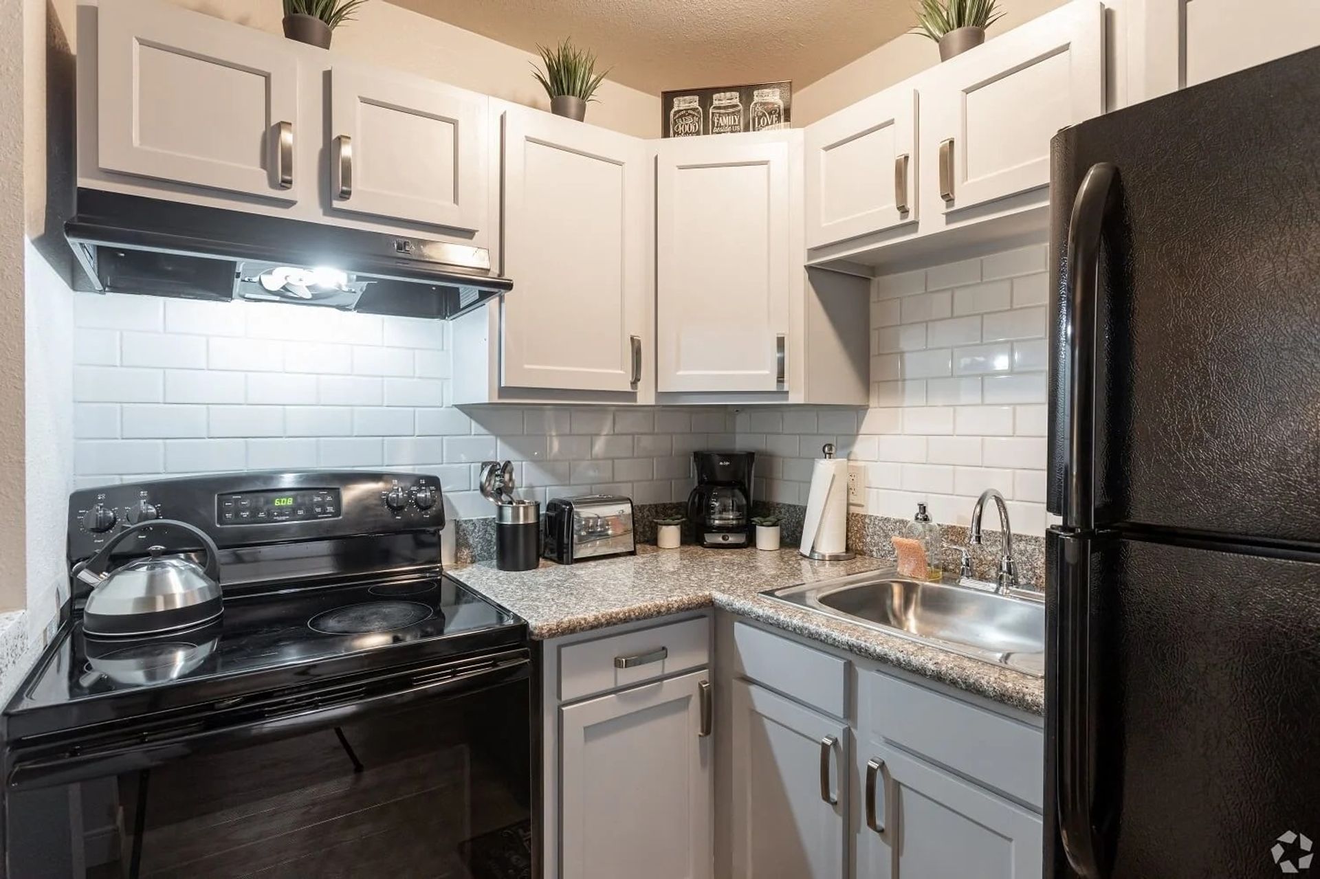 Apartment kitchen — representative home at Elevate at South Mountain.
