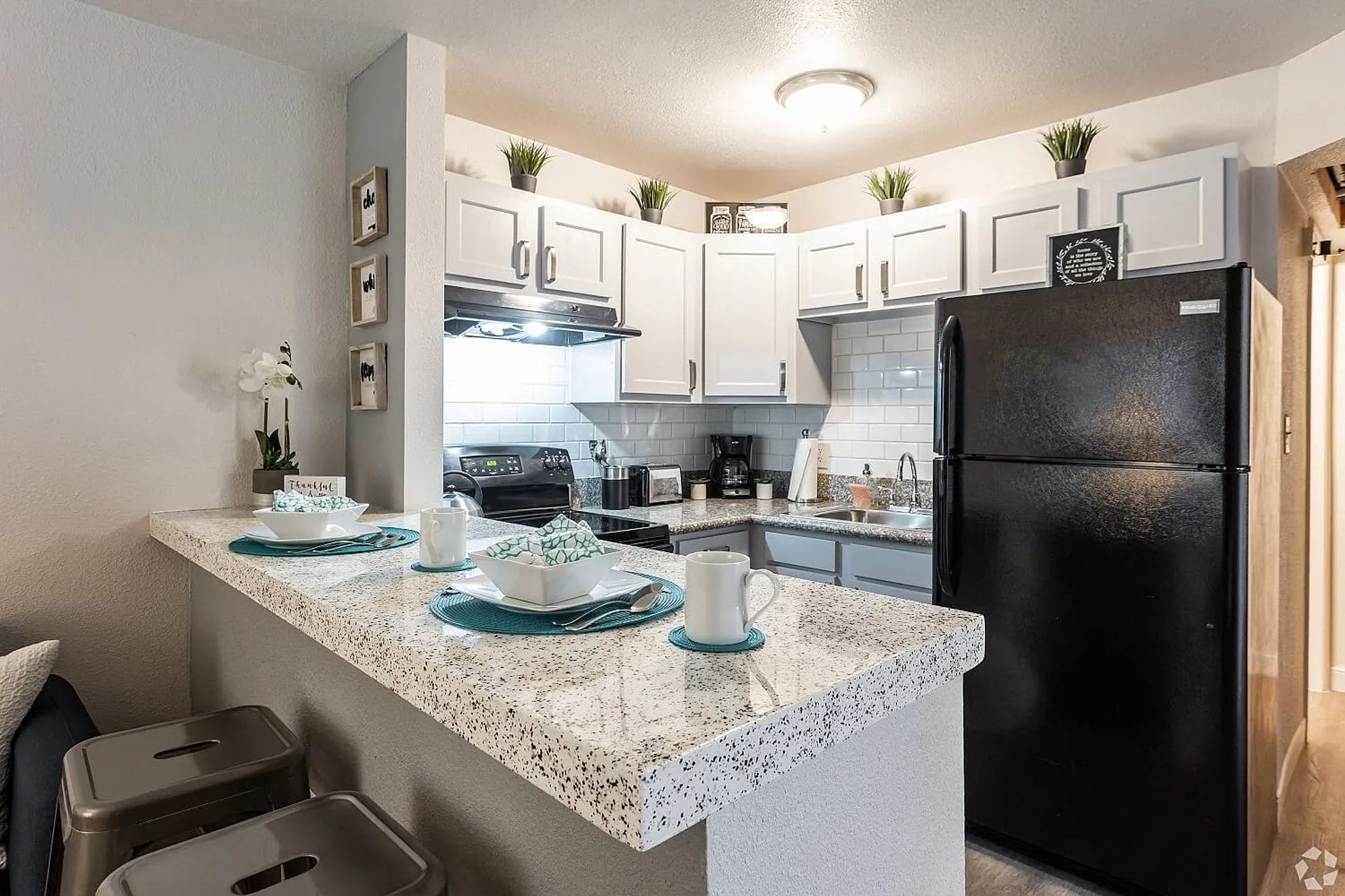 Apartment kitchen — representative home at Elevate at South Mountain.