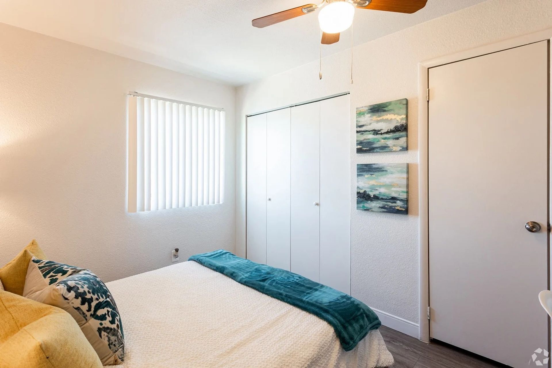 Furnished bedroom shown — representative home at Elevate at South Mountain.