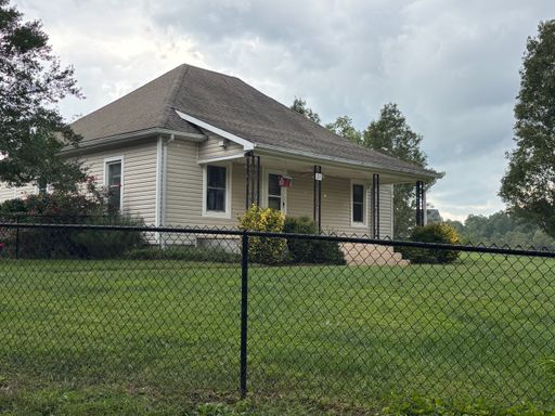 Charming 2-Bedroom Home with Huge Fenced Yard & Sunroom
