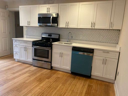 Bright and spacious 2-bedroom apartment at 4163 Ridge Avenue, Unit 1 – photo 1