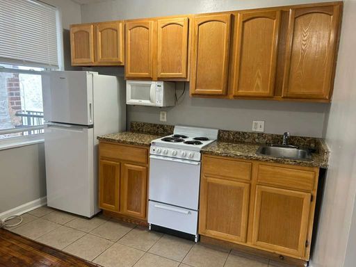 This cozy 1-bedroom, 1-bathroom apartment at 3412-14 #B16 Spring Garden Street offers a comfortable and inviting living space in the heart of Philadelphia. – photo 1