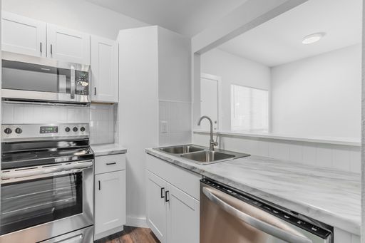 Renovated units with private garage! – photo 1