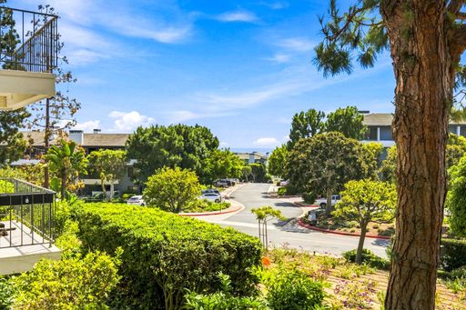Coastal Condo in Gated Versailles Community – photo 1