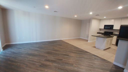 Spacious 2 Brs + 2.5 Baths townhome has 2-car garage, kitchen island and Washer/Dryer – photo 1