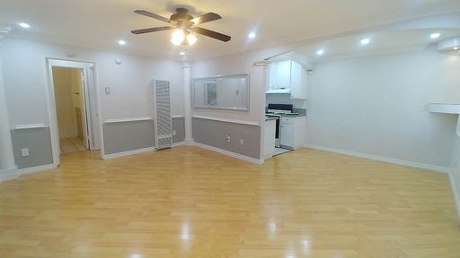 Spacious 1 Br Apt has Balcony, built-in lighted corner shelves & deluxe upgrades – photo 1