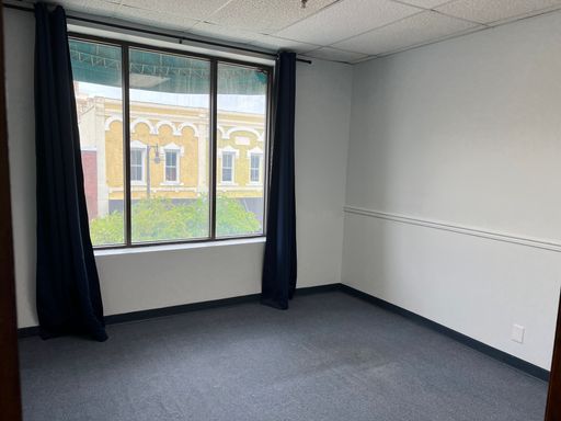 "Charming private corner suite available in a historic downtown setting"